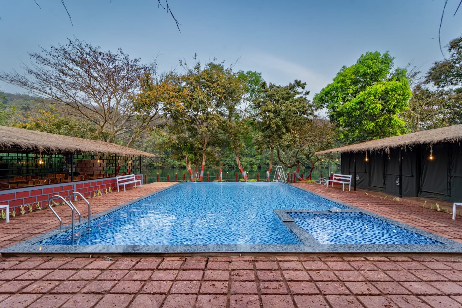 Nadi Teera Dandeli swimming pool with Kali River and Western Ghats view