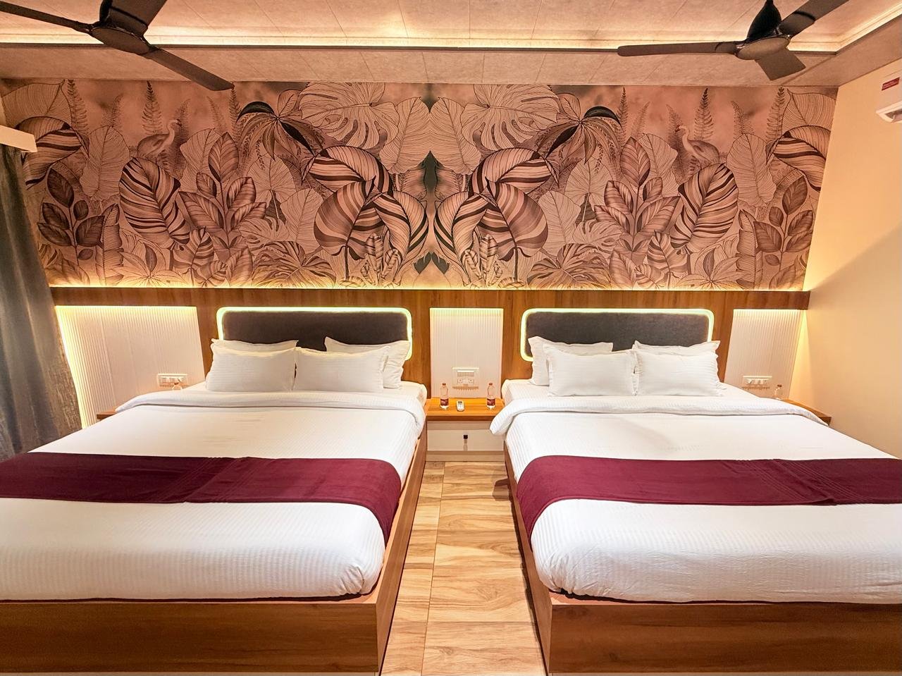 Premium AC cottage twin bed configuration at Nadi Teera Dandeli for families